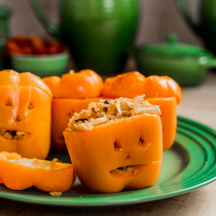 Jack-O-Lantern Stuffed Peppers recipe served on plate