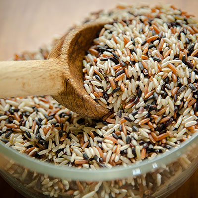 whole grain rice uncooked in bowl